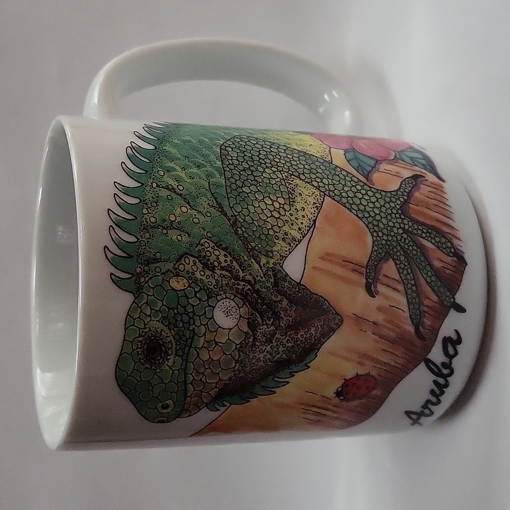 Souvenir Coffee Mug With An Iguana And Ladybug On A Hibiscus Branch